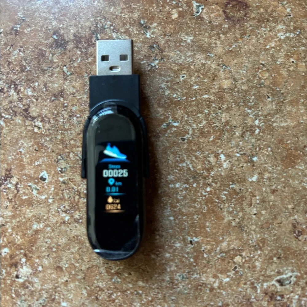 Black Fitness Tracker with Sleek Design and Wristband